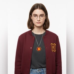 NWT Harry Potter Gryffindor Resin pendant $17 in antique-style filigree bezel